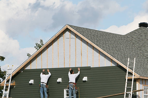Professional Siding Contractor technician working in Fuquay-Varina, NC